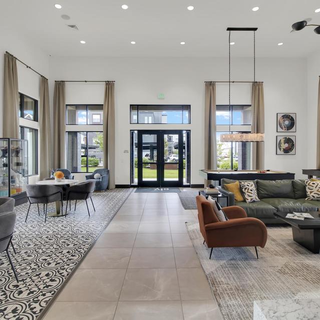 Ember Peaks at American Fork - Living Space with Tables and Chairs and View Outside